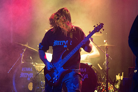 man wearing black shirt playing guitar thumbnail