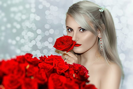 woman smelling rose thumbnail