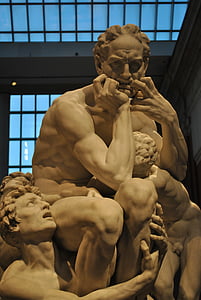 man statue near window thumbnail