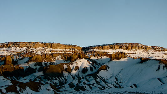landscape photography of cliff coated with snow thumbnail