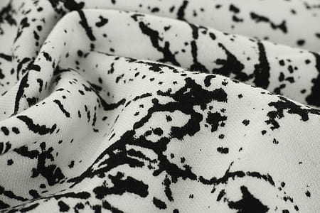 white and black textile thumbnail