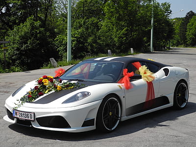 black coupe with flower decor thumbnail