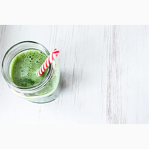 clear glass mason jar filled with frappe and straw thumbnail