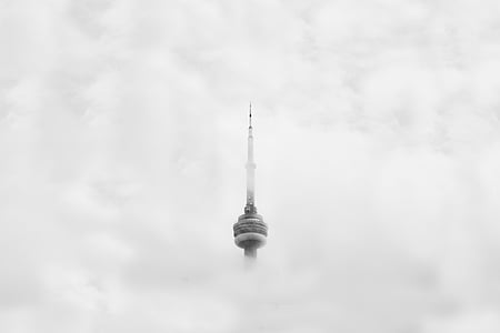 photo tower surrounded by clouds thumbnail