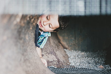 boy in blue plaid button-up t-shirt thumbnail