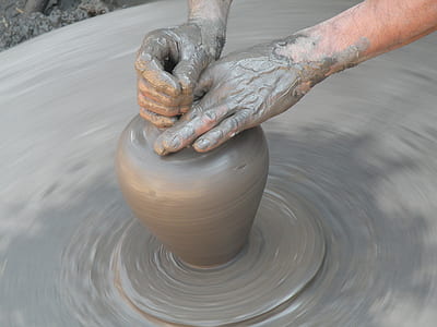 person making pot thumbnail