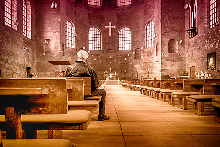 man sitting on church bench thumbnail
