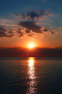 Calm Blue Sea During Golden Hour thumbnail