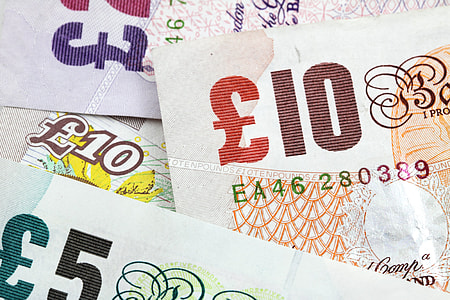 closeup photo of 5 and 10 banknotes thumbnail