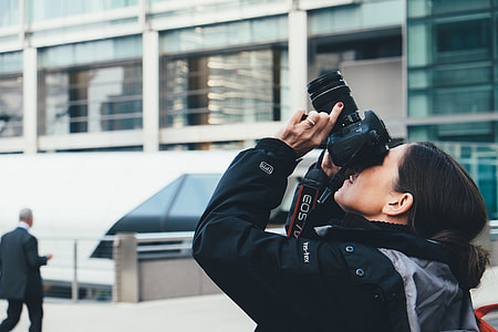 woman pointing camera upward thumbnail