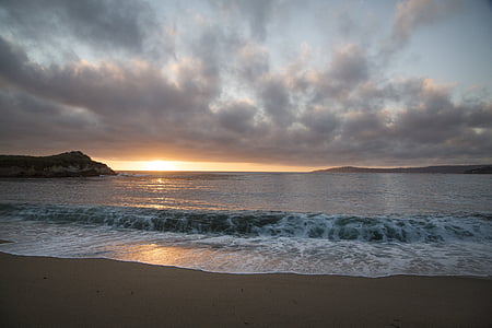 blue sea under cloudy sky thumbnail