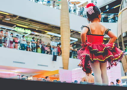 girl in pink and black dress thumbnail