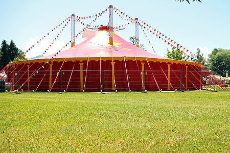 red carnival tent at day time thumbnail