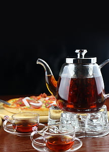 glass teapot filled with liquid thumbnail