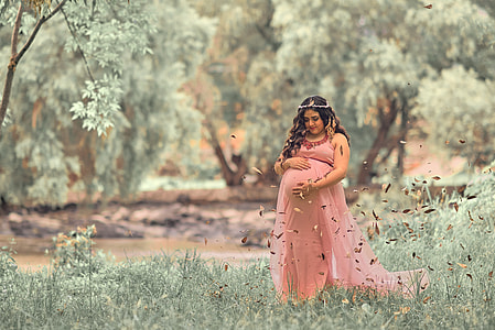woman standing on green grass plant thumbnail