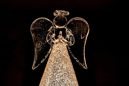black photography of angel glass figurine thumbnail
