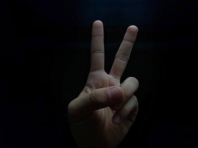 person showing peace handsign thumbnail