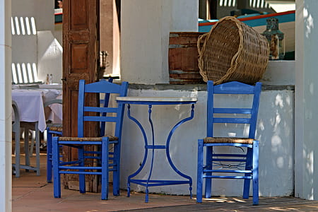 white table in between two chairs thumbnail