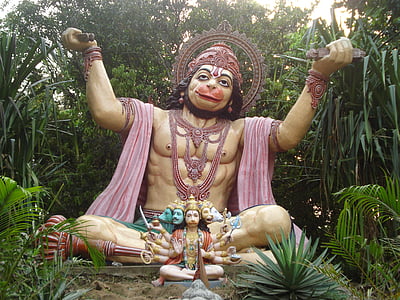 Lord Hanuman statue and statuette placed on ground thumbnail