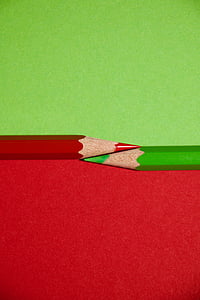 two red and green colored pencils thumbnail