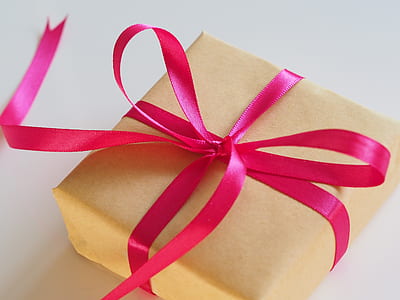photo of square yellow box with pink ribbon thumbnail