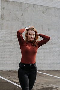 woman holding her hair thumbnail
