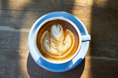 flower latte in teacup with saucer thumbnail