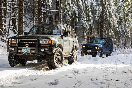 two cars on snow field thumbnail