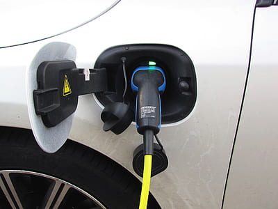 gray vehicle parked on gasoline station thumbnail