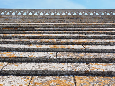 grey and beige concrete bleachers thumbnail