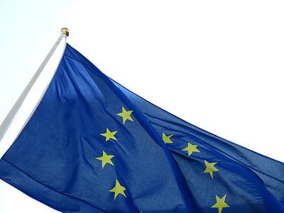 blue and yellow country flag under white sky thumbnail