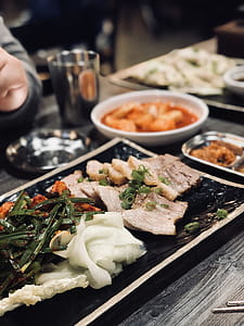 Plate Of Thin Sliced Meat thumbnail