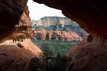 group of people standing on cliff thumbnail