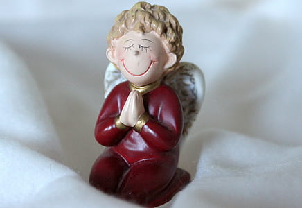 gray haired angel figurine thumbnail
