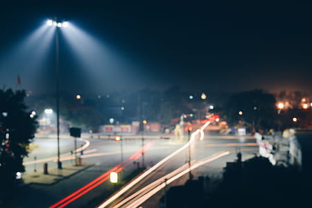 Time Lapse Photo of Road With Red and Yellow Lights thumbnail