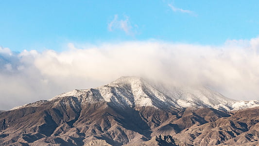aerial view photography of mountain covering with clouds thumbnail