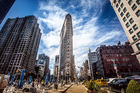 low angle photography of flatiron building during daytime thumbnail