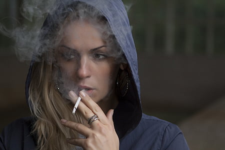 woman wearing blue hooded jacket thumbnail