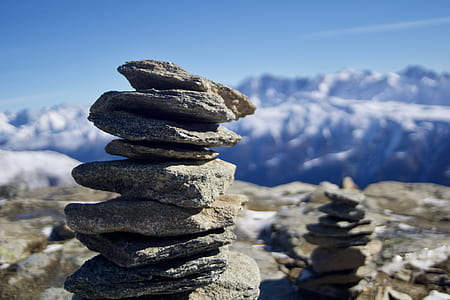 selective focus photograph of cairn thumbnail