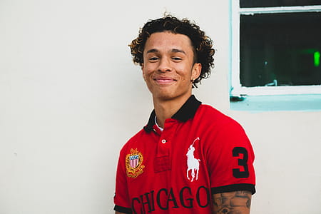 Man in Red and Black Polo Shirt thumbnail