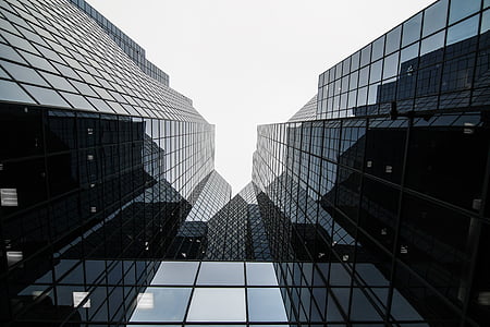 low-angle photography of black high-rise building thumbnail