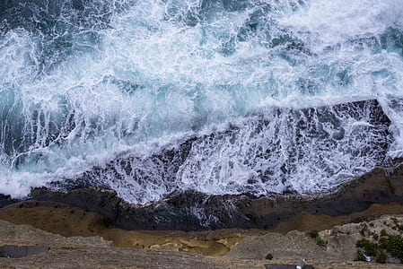 aerial view photography of body of water and shore thumbnail