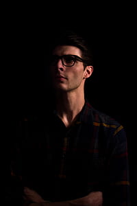 standing man with black background thumbnail