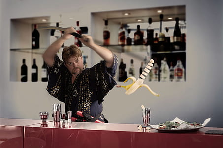 man holding katana slicing banana thumbnail