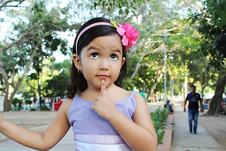 girl wearing purple spaghetti strap top near man in black shirt thumbnail