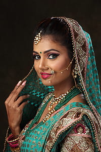 Woman Wearing Green, Brown, and Pink Sari Dress Portrait Photograph thumbnail