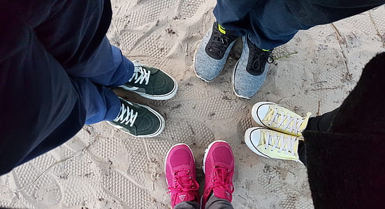 high angle photography of person's shoes on ground thumbnail