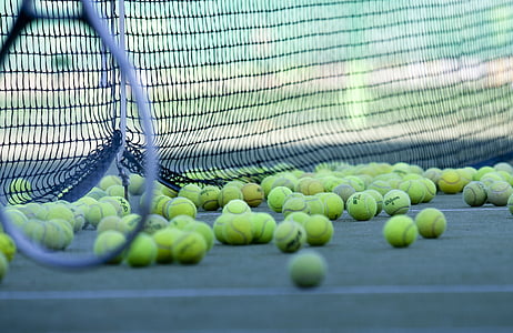 tennis balls under net thumbnail