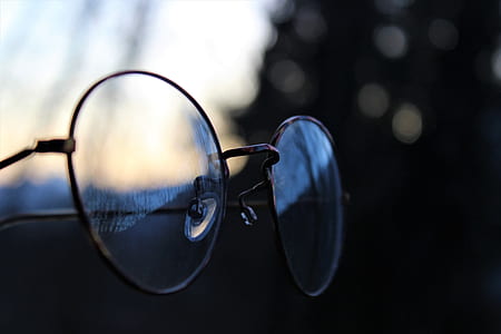 selective focus photography of eyeglasses thumbnail