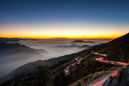 aerial photography of road near mountain thumbnail